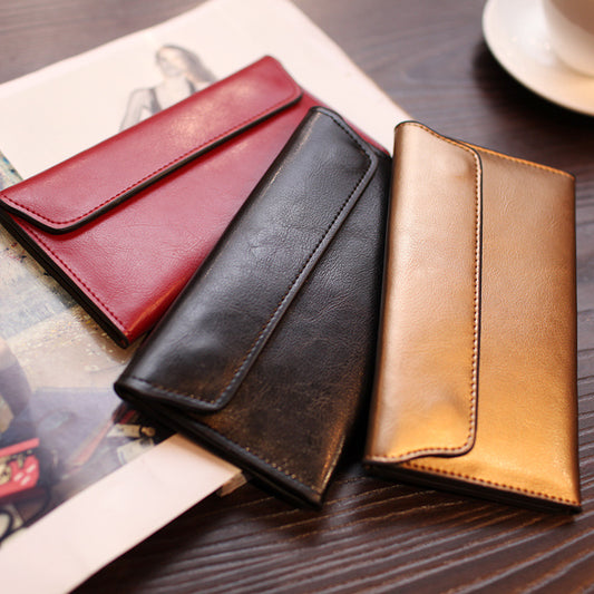 2024 New Hotan and Newn Famous Long Wallet Women's Leather Buckle Simple Business Cowhide Thin Wallet Card Fashion