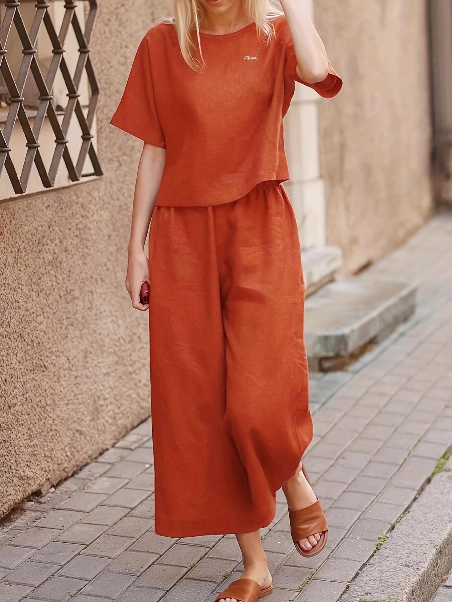 Two-Piece Crew Neck Loose Fit Outfit - Soft Polyester Short Sleeve Top & Wide Leg Pants Set for Elegant Women - Spring/Summer Casual Wear, Solid Color, No Printing, Woven Fabric